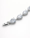 Lumière drop tennis bracelet close-up with clear zircon stones, silver plated