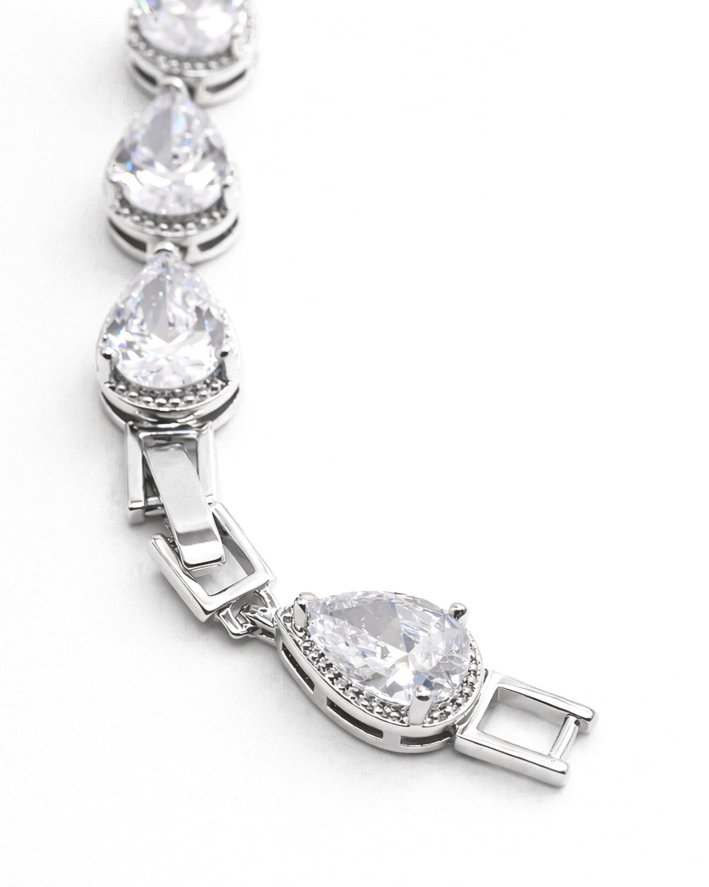 Lumière drop tennis bracelet close-up with clear zircon stones in silver plating