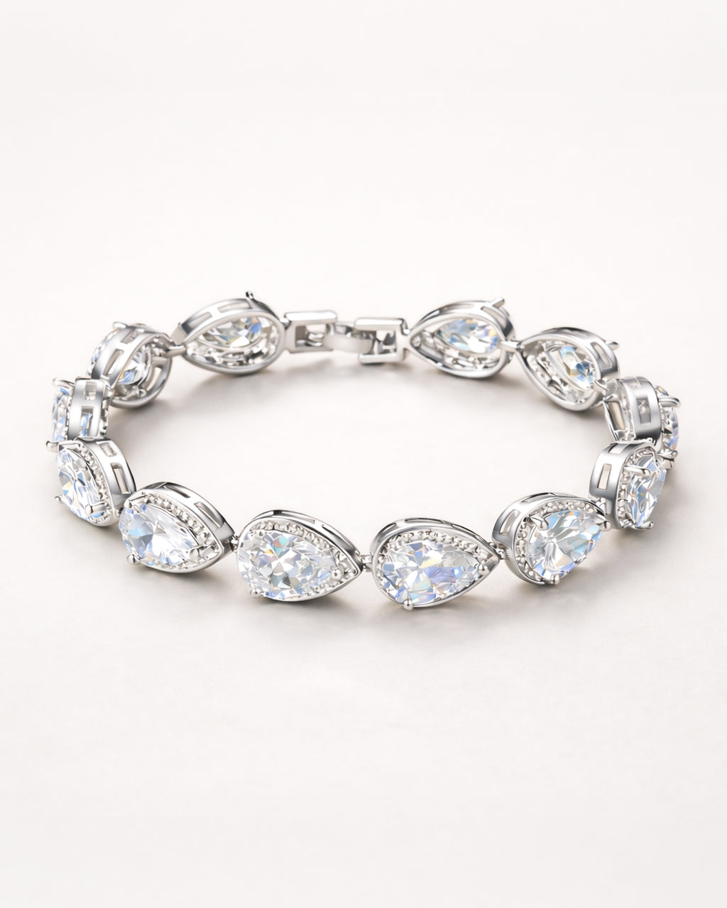 Lumière drop tennis bracelet with clear zircon stones in silver plated finish