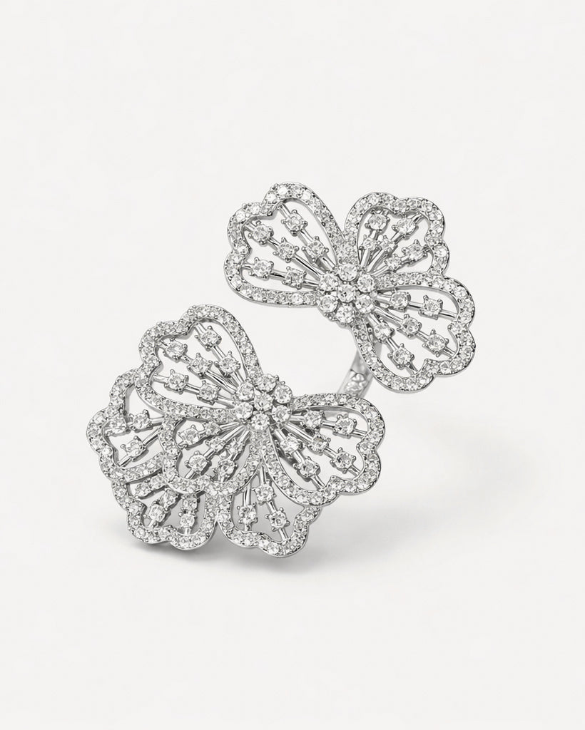 Floral adjustable silver ring with sparkling zircon stones, elegant flower design view
