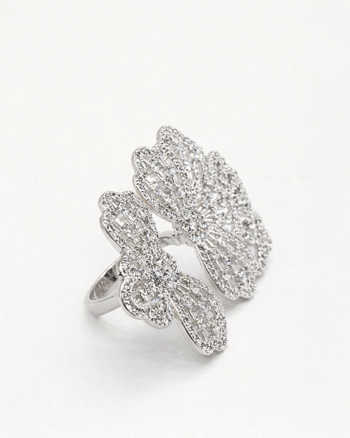 Floral adjustable silver ring with zircon stones, elegant openwork flower side view