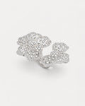 Floral adjustable silver ring with zircon stones, elegant openwork flower top view