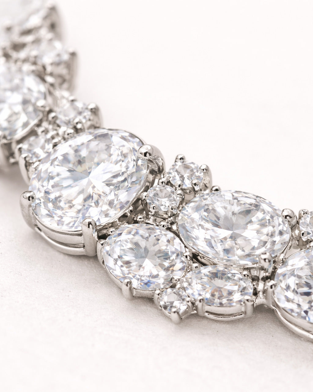 Jadejuri silver tennis bracelet with oval cubic zirconia stones, macro close-up