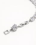Oval CZ tennis bracelet in silver plated finish with secure clasp, close-up detail
