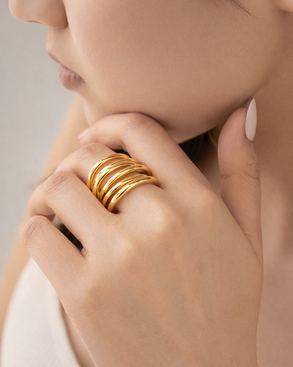 18K gold-plated luxe layer ring on model hand, elegant modern minimalist jewelry