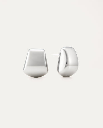 Pair of silver hoop earrings on a white background