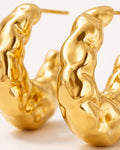 18k gold-plated molten sculpt hoop earrings, chunky statement hoops close-up