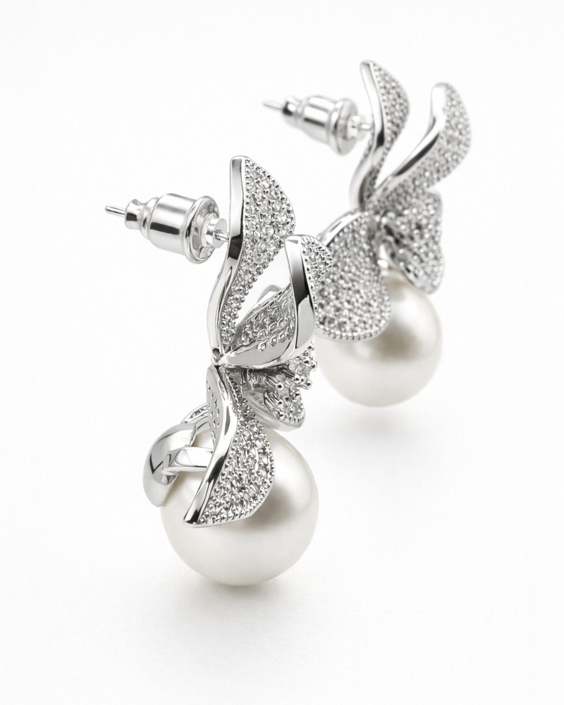 Silver pearl drop earrings side view with cubic zirconia floral design for women