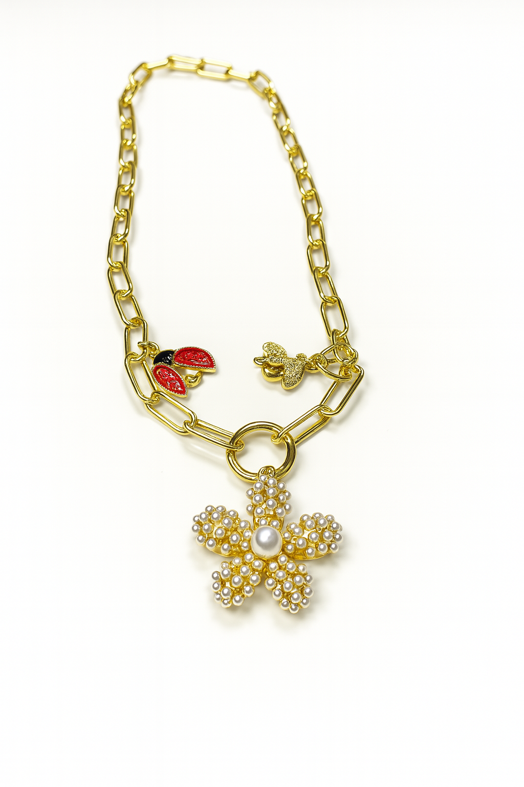 Gold necklace with seahorse and mermaid tail charms – ocean-inspired jewelry by Jadejuri