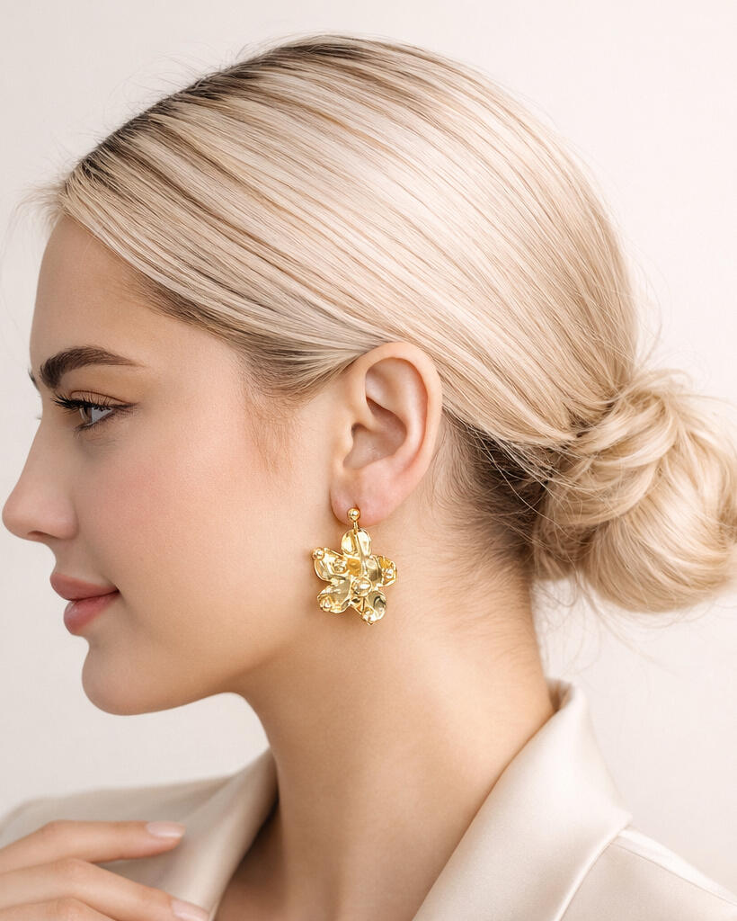 18K gold-plated petal drop earrings on model, sculptural floral statement earrings with polished finish
