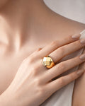 18K gold-plated pyramid signet ring on model hand, modern minimalist jewelry