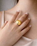 18K gold-plated pyramid signet ring on model hand, modern minimalist jewelry