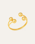 Quad Sphere Cuff Bracelet with four gold spheres and dual open band – Jadejuri