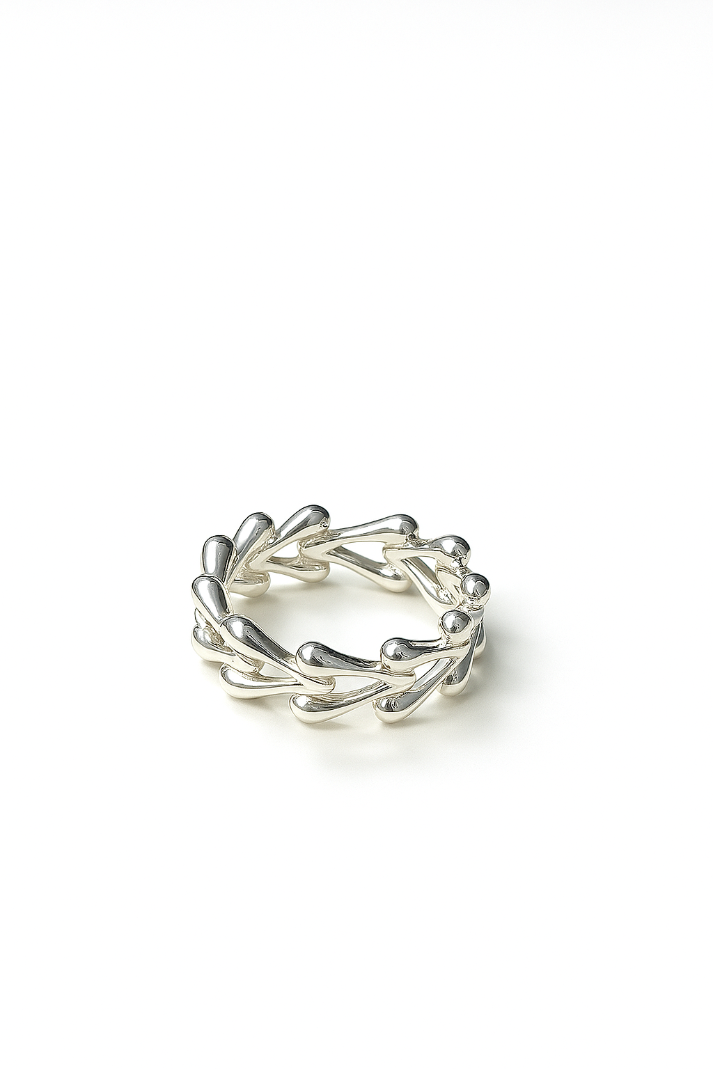 delicate silver ring with teardrop vine design on white background
