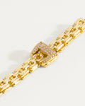 Gold-plated regal link buckle bracelet close-up, modern minimalist jewelry style