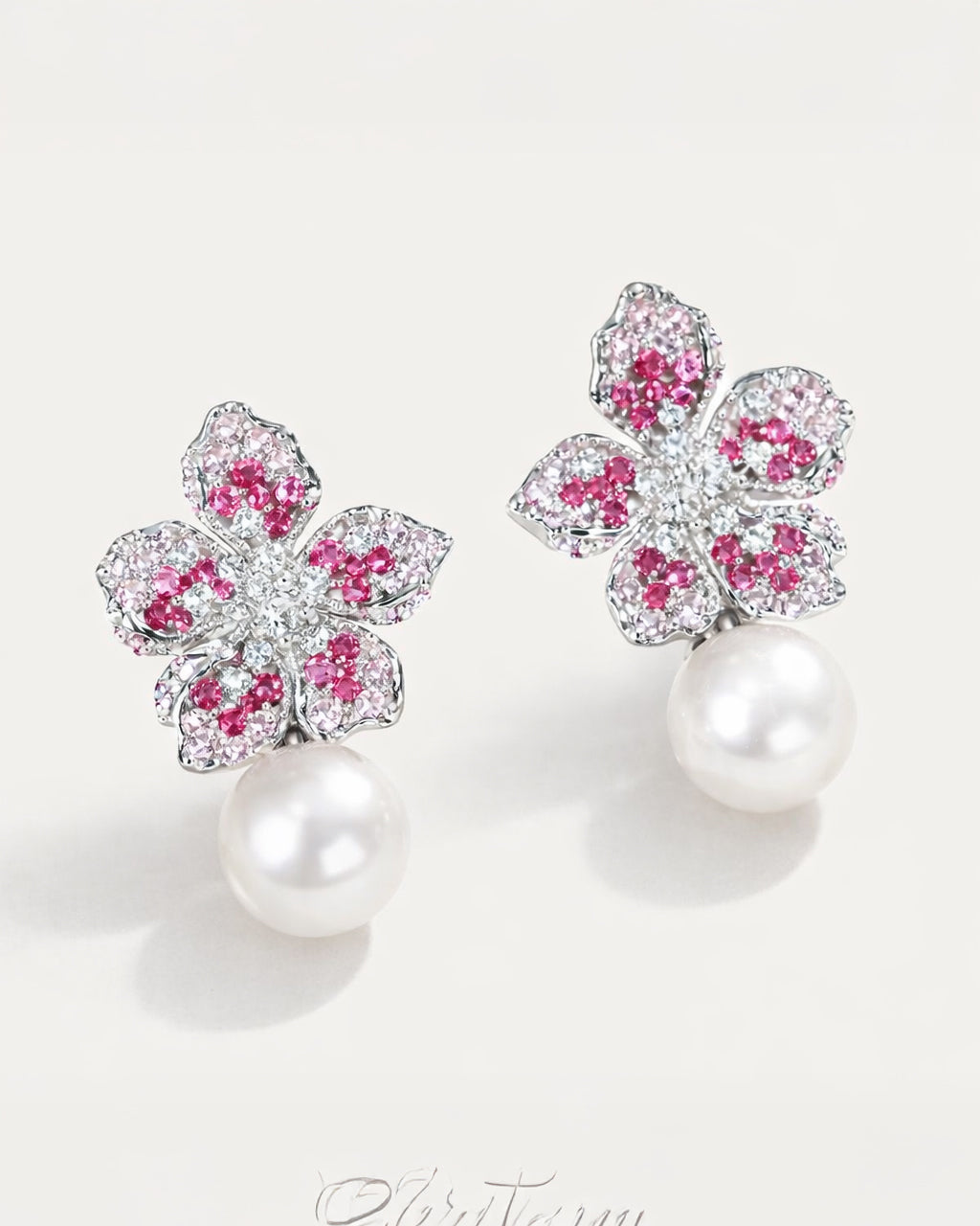 Rose flora pearl drop earrings with pink zircon silver plated top flatlay