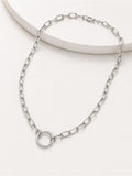 Silver chain necklace on a white background