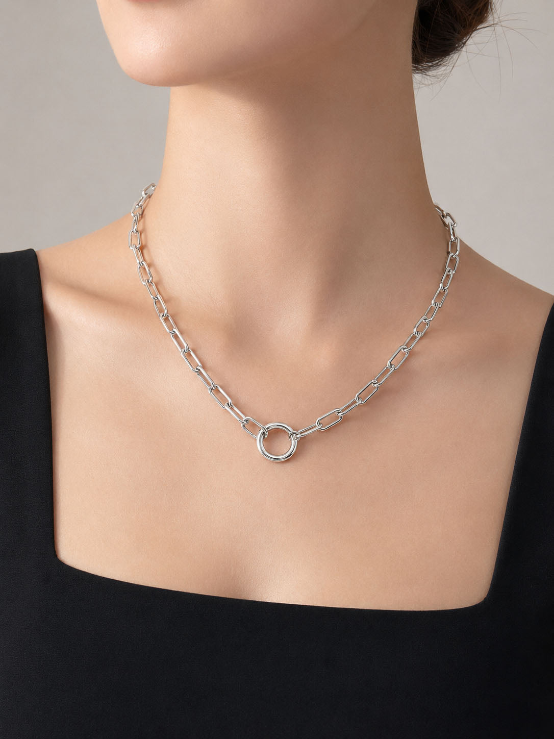 Silver chain necklace on a white background