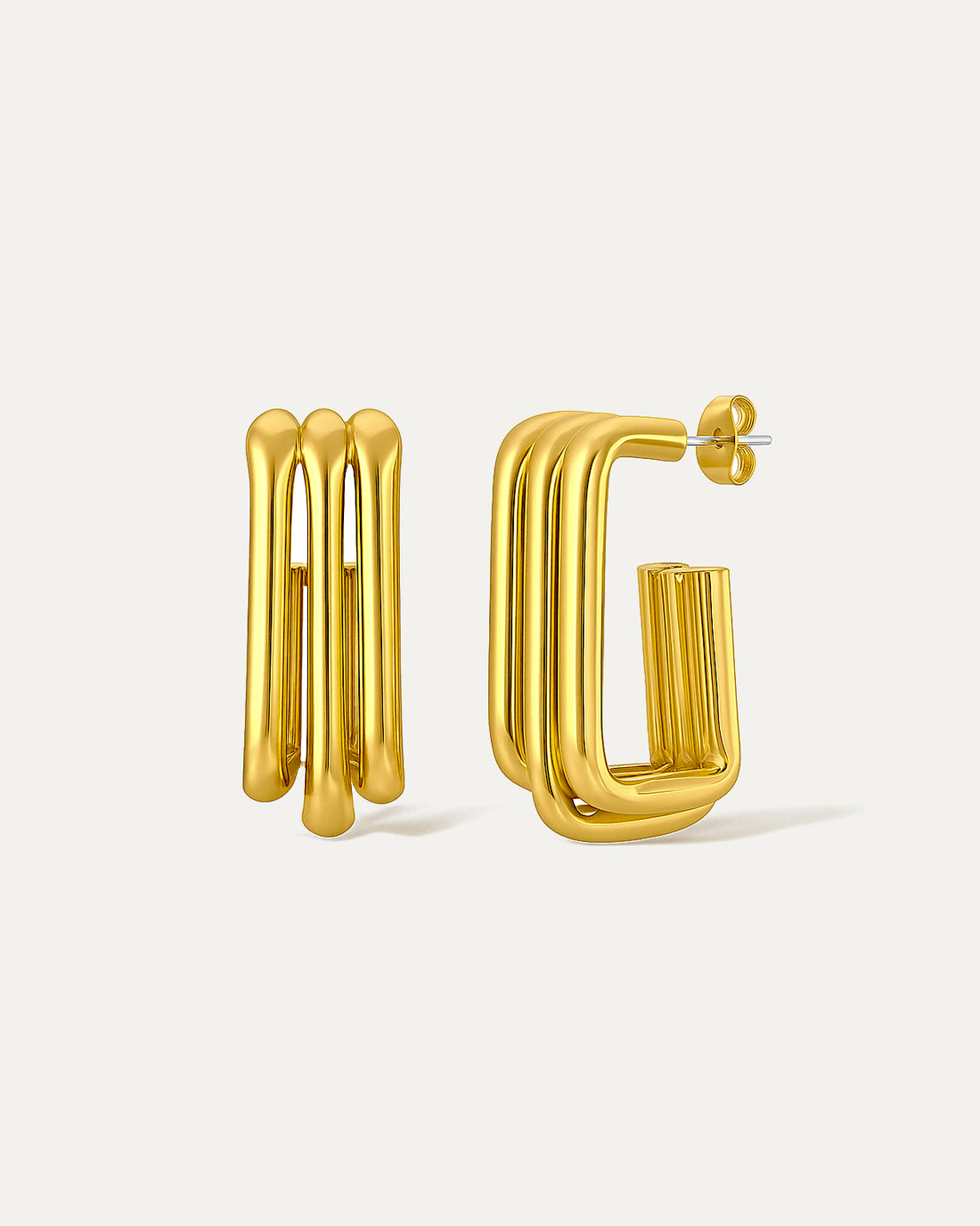 Gold sculpted column hoops with bold geometric triple-bar design, modern fashion earrings for statement wear.