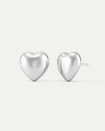 Sterling silver sculpted heart stud earrings with high-polish finish.