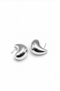 Silver sculpted teardrop-shaped stud earrings with smooth high-polish finish