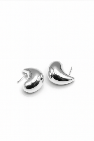 Silver sculpted teardrop-shaped stud earrings with smooth high-polish finish