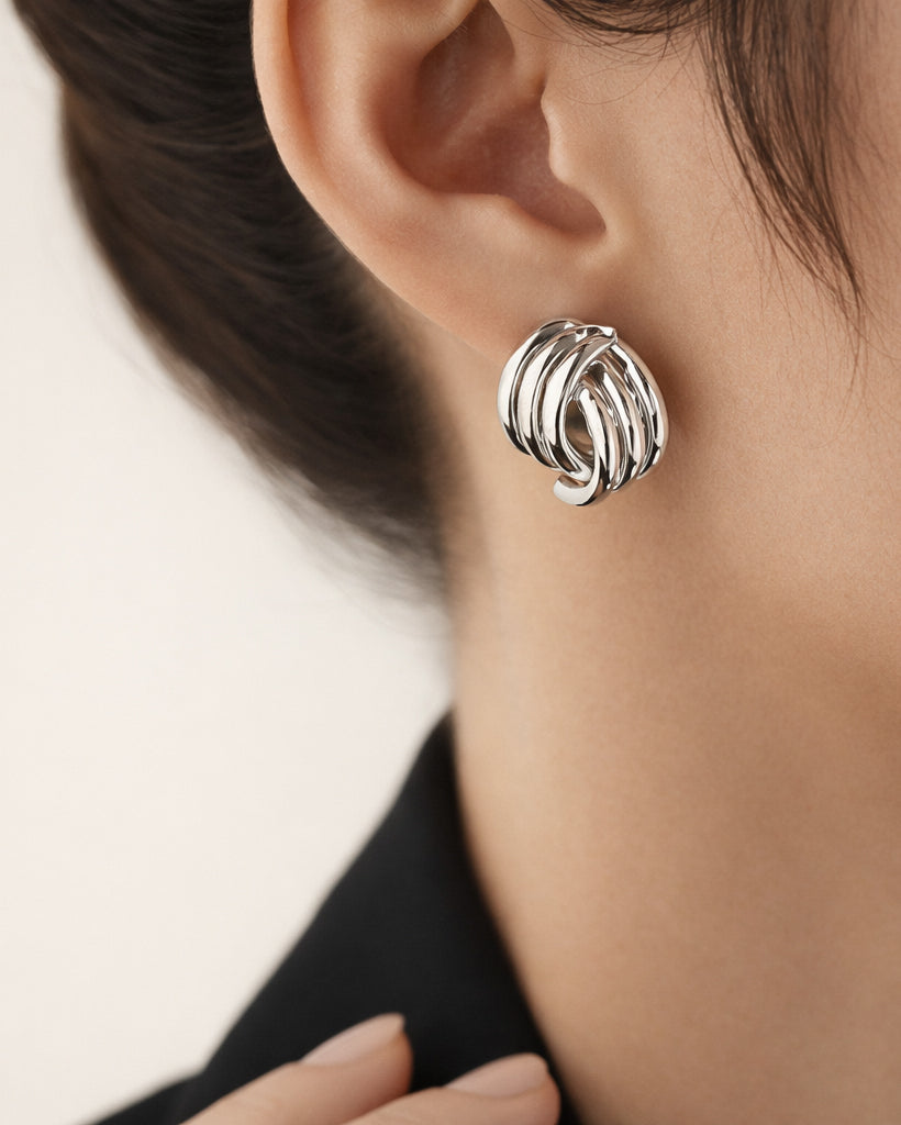 Sterling silver semi striped stud earrings on model, modern minimalist jewelry look