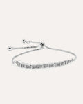 Silver bracelet with chain and clasp on a white background