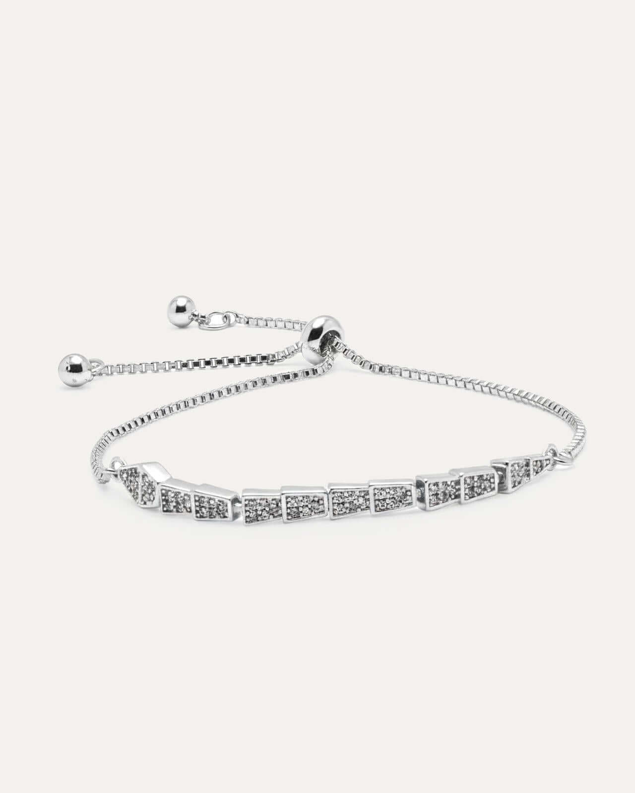 Silver bracelet with chain and clasp on a white background