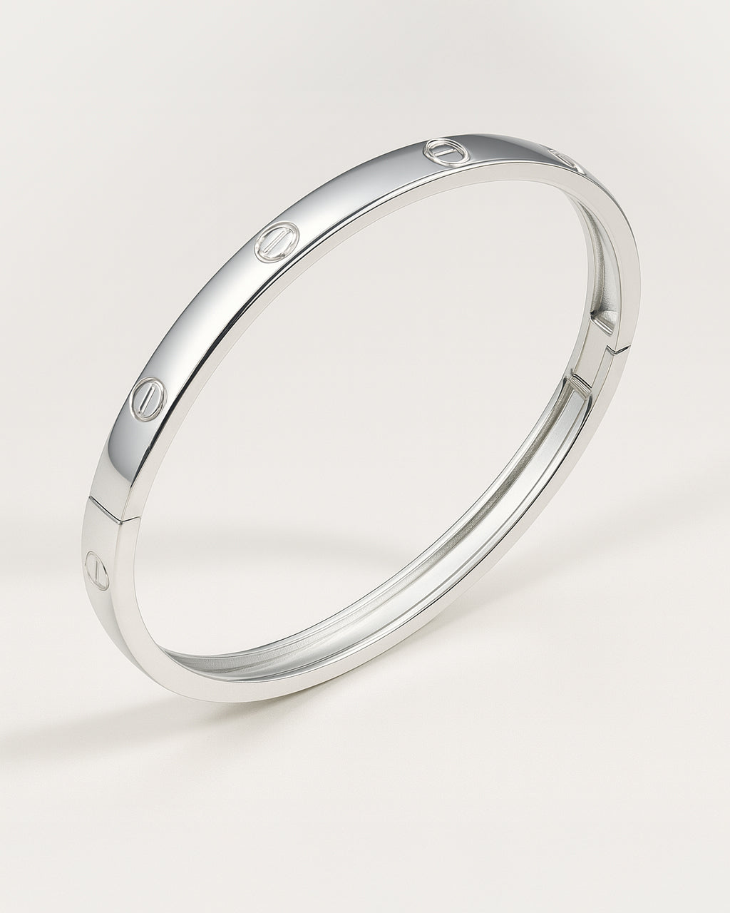 Polished silver bangle with screw motifs – Sleek Bold Bangle.