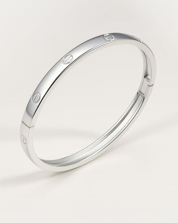 Polished silver bangle with screw motifs – Sleek Bold Bangle.