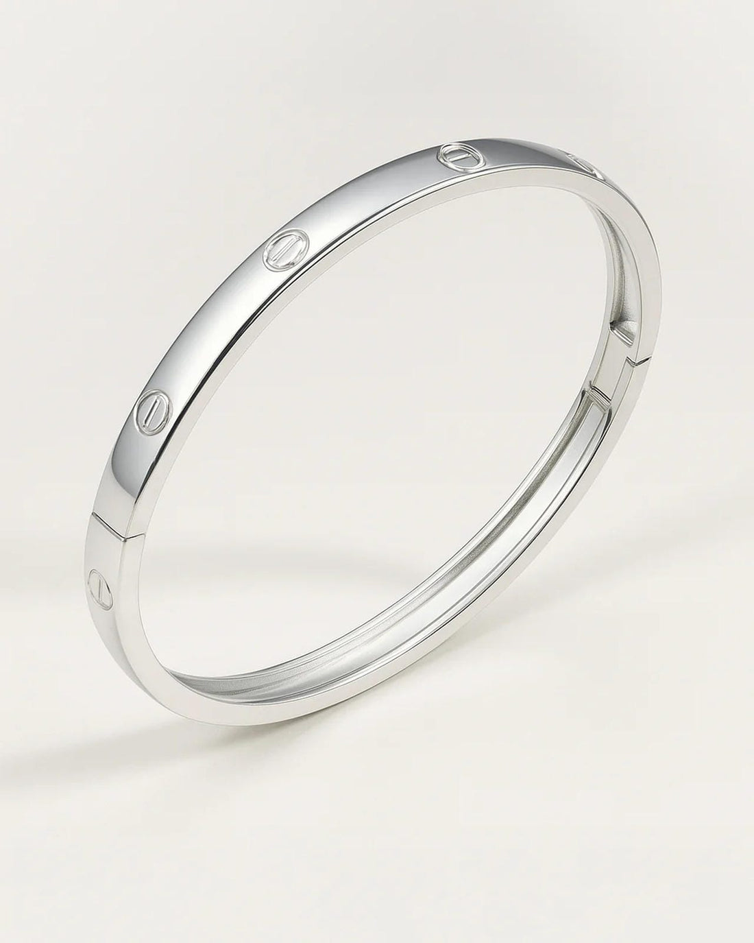 Polished silver bangle with screw motifs – Sleek Bold Bangle.