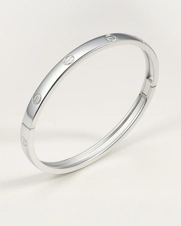 Polished silver bangle with screw motifs – Sleek Bold Bangle.