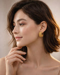Model wearing 18K gold-plated ribbed hoop earrings minimalist women jewelry
