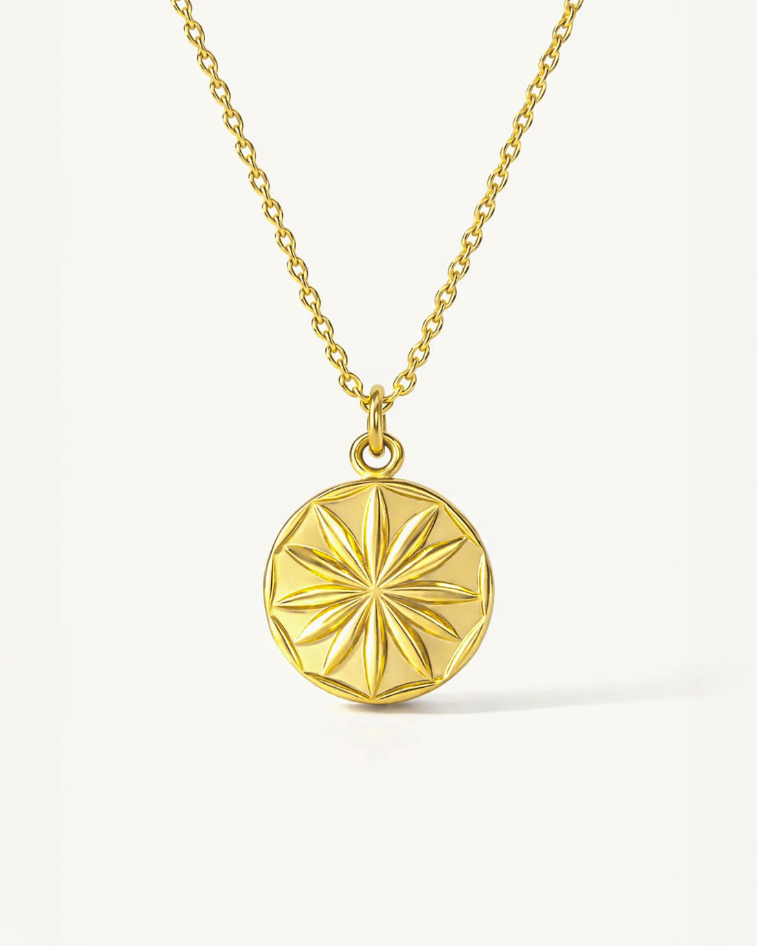 18K gold-plated star coin pendant necklace, minimalist celestial jewelry close-up