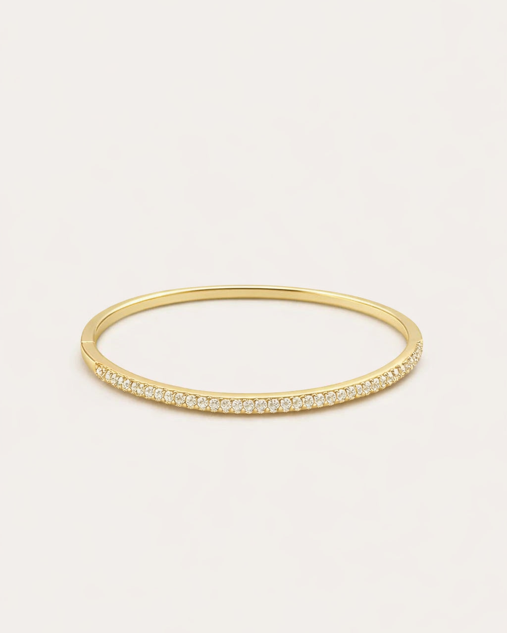 18K gold-plated crystal bangle bracelet front view, elegant minimalist jewelry design