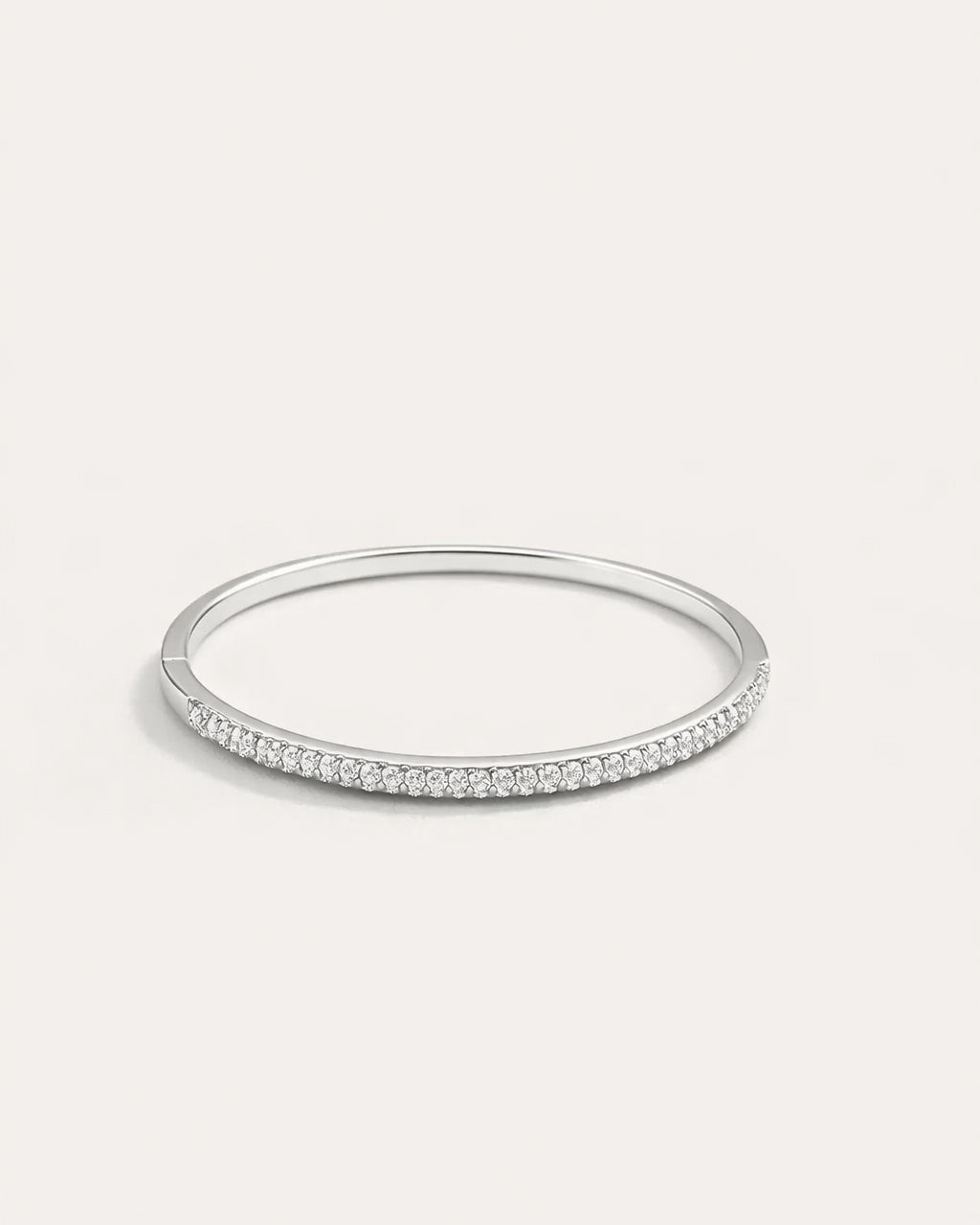 Silver-plated crystal bangle bracelet front view, elegant minimalist jewelry design