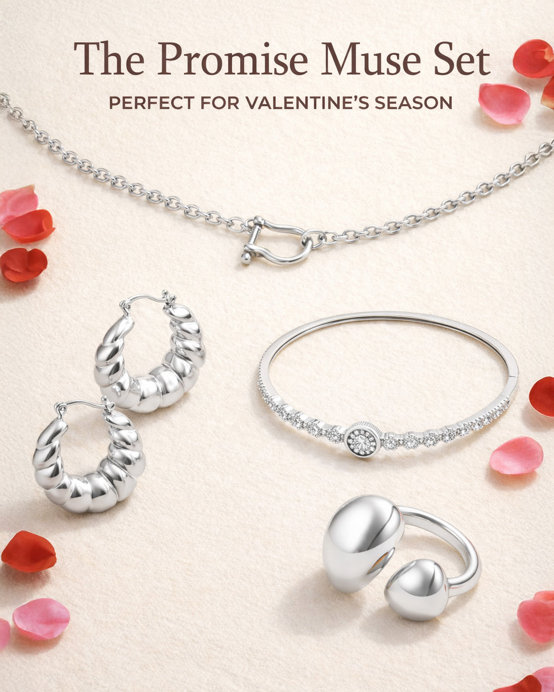 Silver jewelry set including necklace, earrings, and bracelet with Valentine's Day theme.