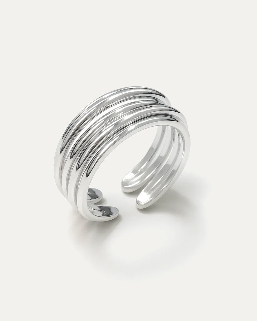Silver multi-band ring on a white background