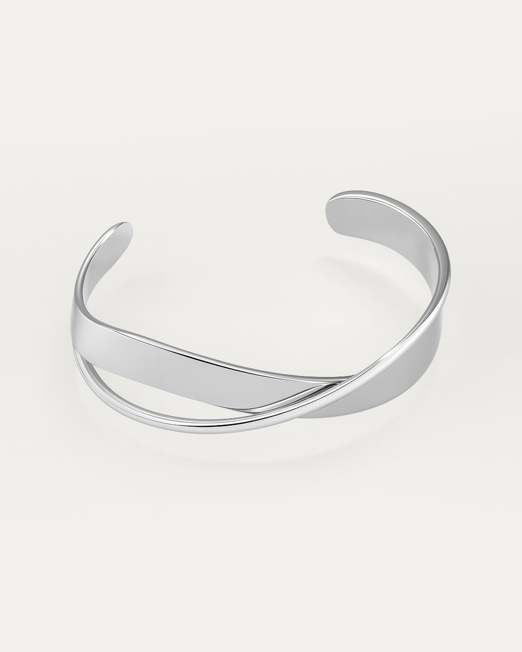 silver statement ring with layered stripe design and open adjustable back on white background