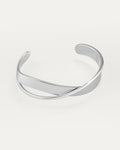 silver statement ring with layered stripe design and open adjustable back on white background