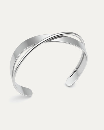 silver statement ring with layered stripe design and open adjustable back on white background