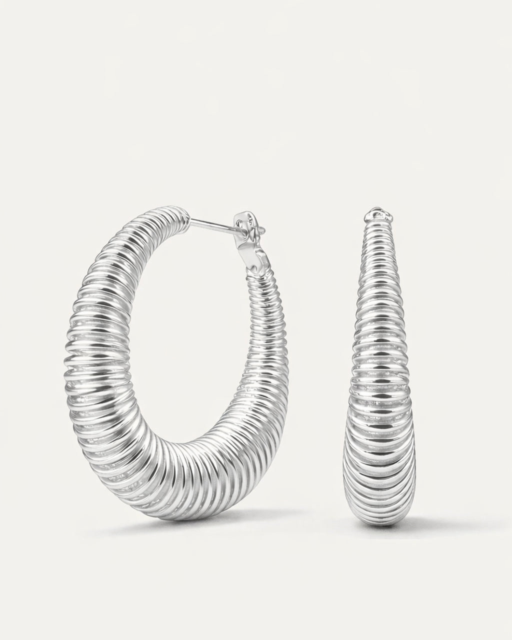 Silver-plated twisted oval spring hoop earrings with coiled texture