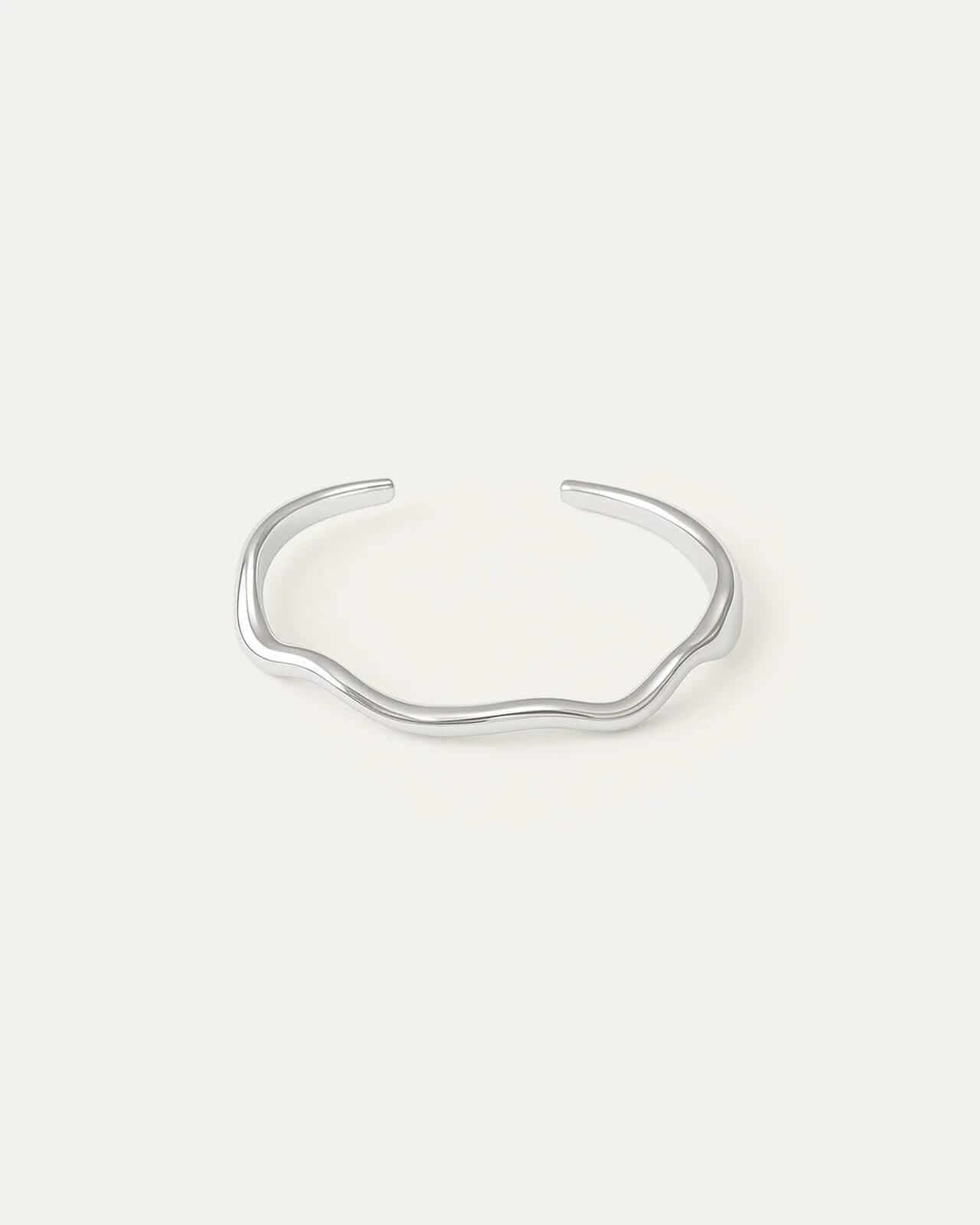 Wavy sterling silver cuff bracelet with fluid, organic shape and smooth finish – Jadejuri