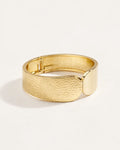 Wide chunky 18K gold plated cuff bracelet with hammered finish, minimalist style