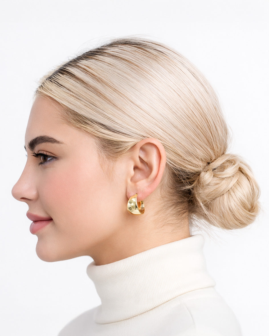 Wide chunky 18K gold plated hoop earrings on model, minimalist women jewelry
