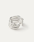 Silver-plated organic wrap ring with fluid curves, minimalist sculptural design