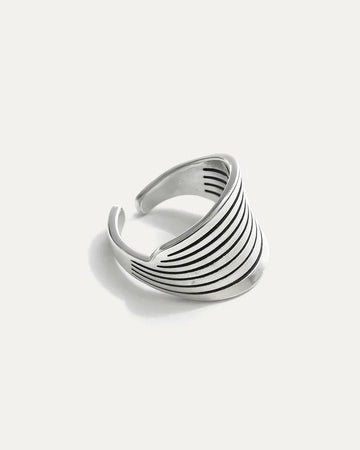 Elegant Wings of Selene silver-plated brass adjustable statement ring with engraved wing-like lines.