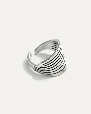 Elegant Wings of Selene silver-plated brass adjustable statement ring with engraved wing-like lines.