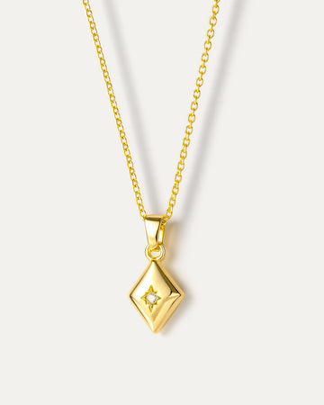 Layered necklace with natural pearl and geometric pendant, crafted from 18K gold-plated brass on neutral background